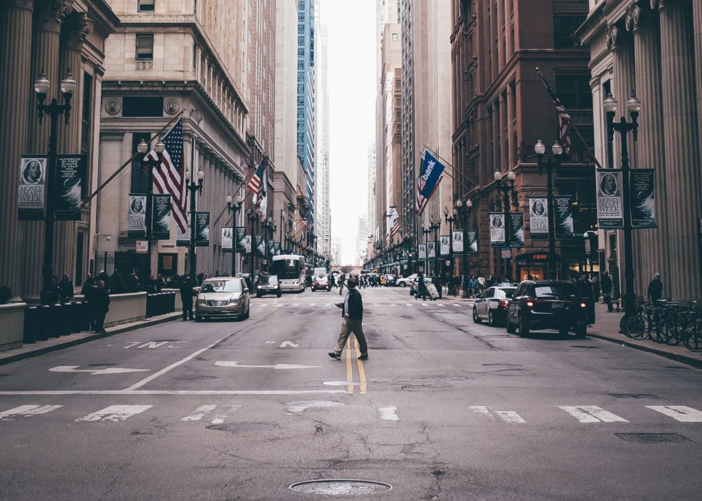 Person crossing city street