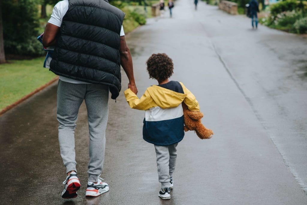 Father and son walking together