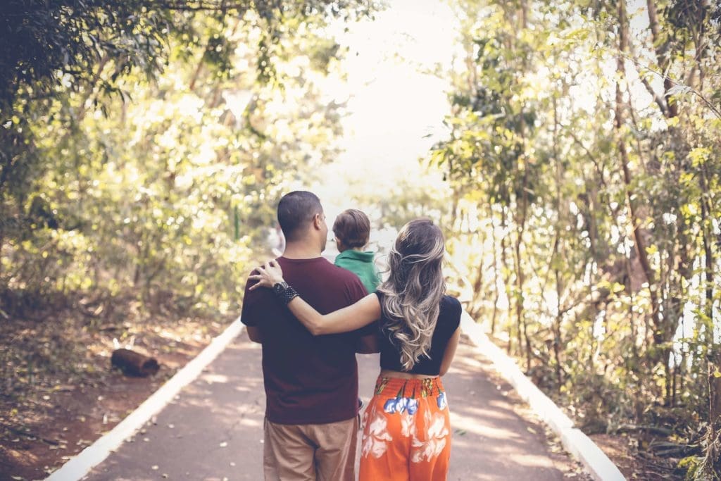 Family storywalk down a path