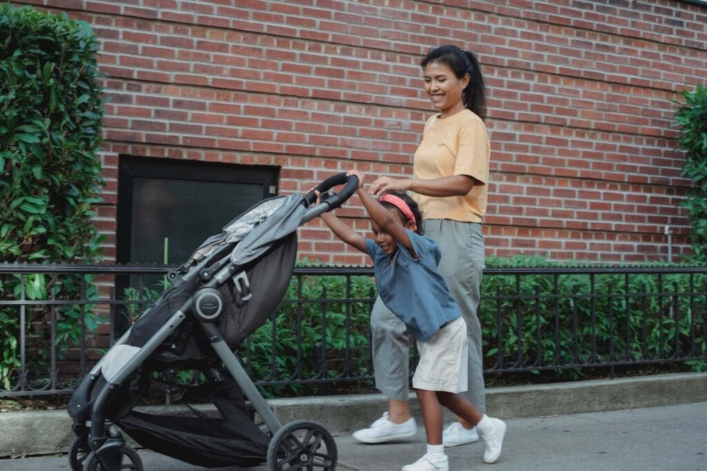 Mother and Child walking with stroller