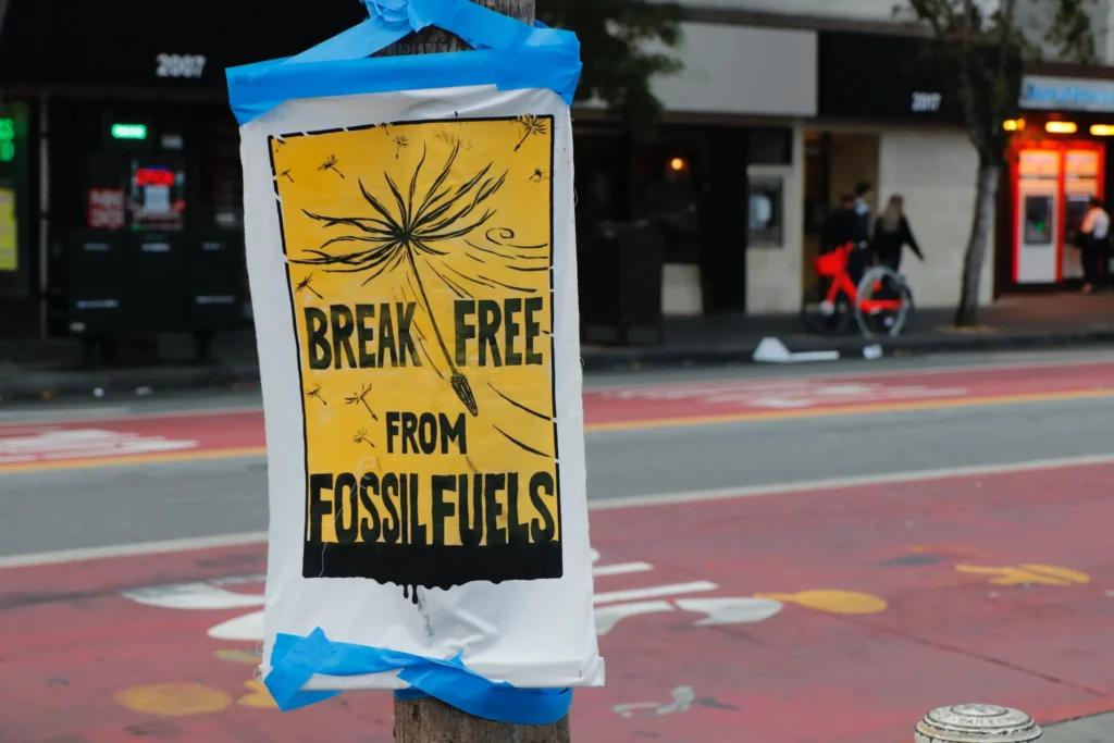 Sign that reads "break free from fossil fuels"