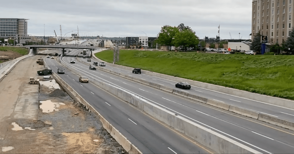 Highway widening through a city